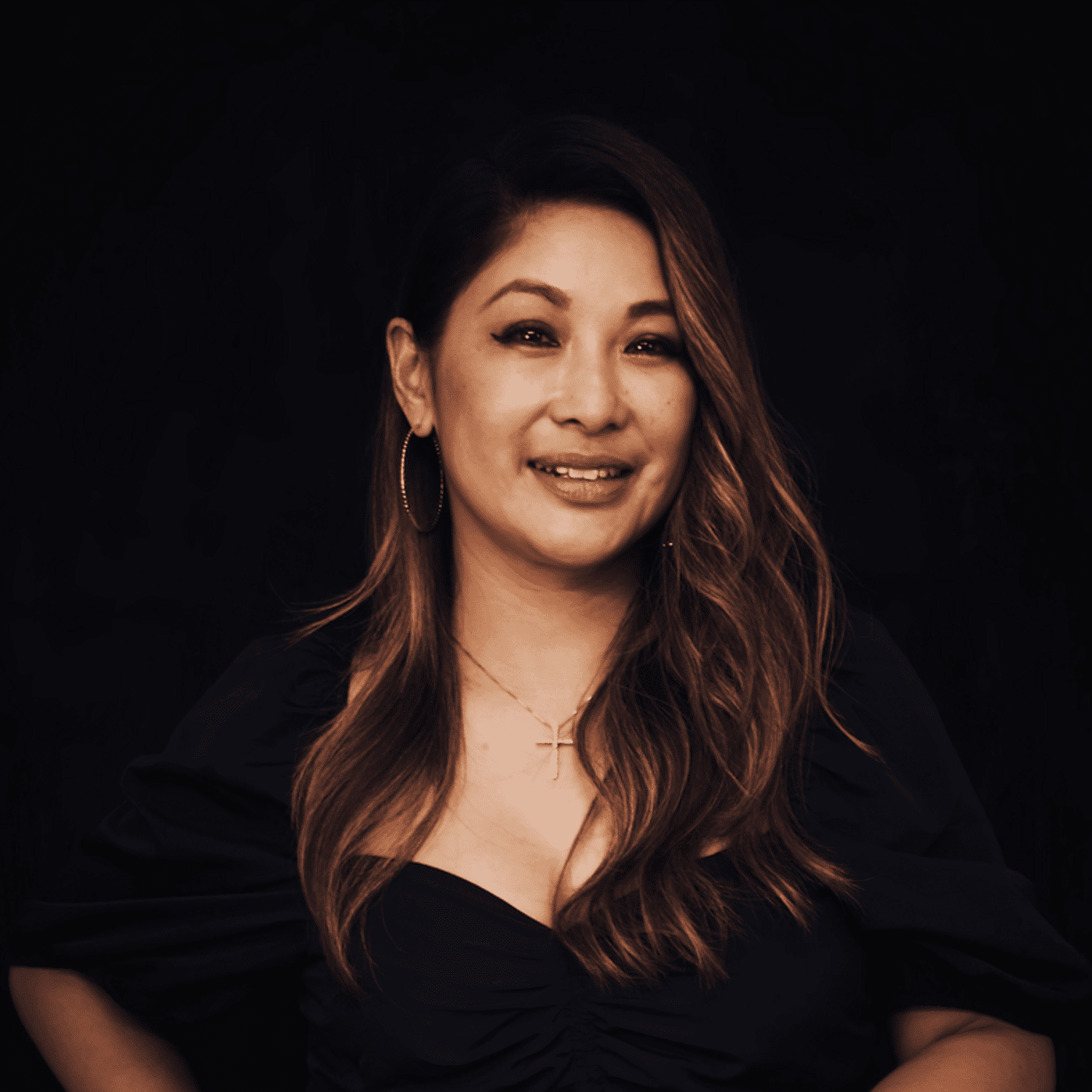 Portrait of MARICELL, a professional stylist at 77Salon Inc., showcasing their expertise and style.