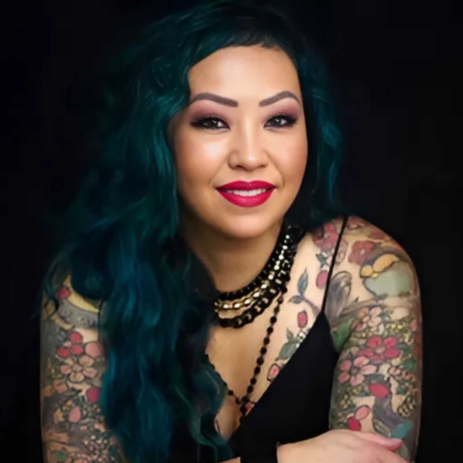 Portrait of JENIFER, a professional stylist at 77Salon Inc., showcasing their expertise and style.