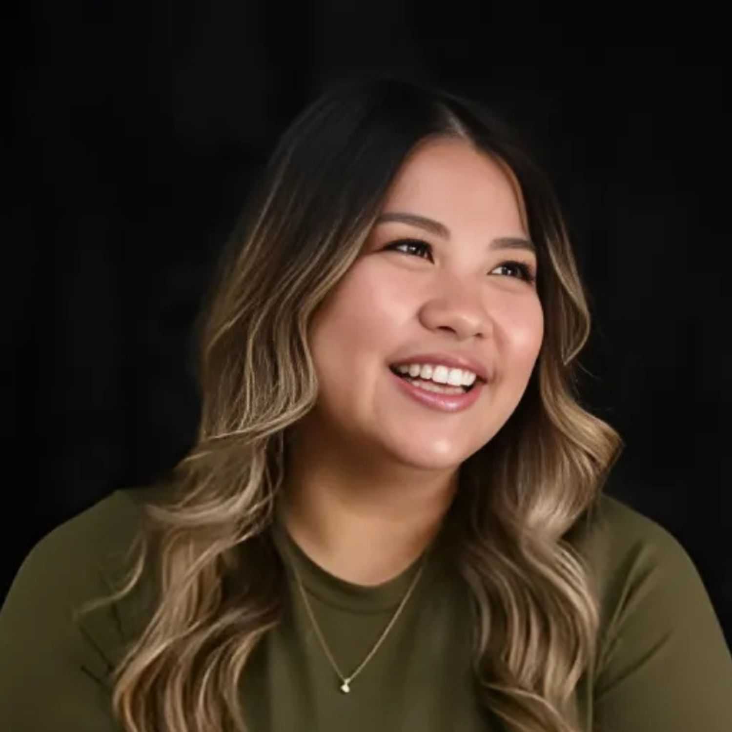 Portrait of ANITA, a professional stylist at 77Salon Inc., showcasing their expertise and style.