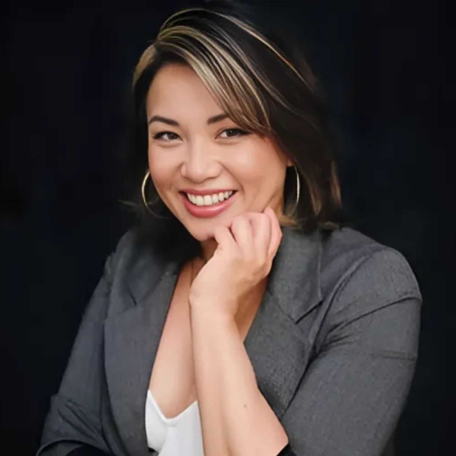 Portrait of KRISTA, a professional stylist at 77Salon Inc., showcasing their expertise and style.